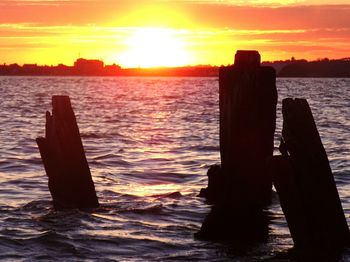 Scenic view of sea at sunset