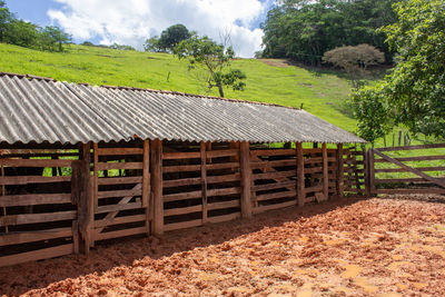 House on field against sky