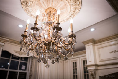 Low angle view of chandelier at ceiling