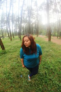 Young woman in forest