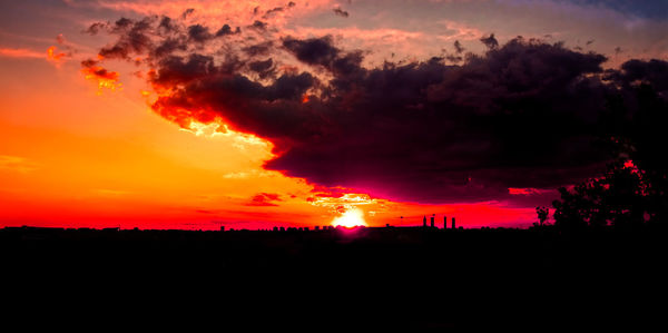 Scenic view of dramatic sky during sunset