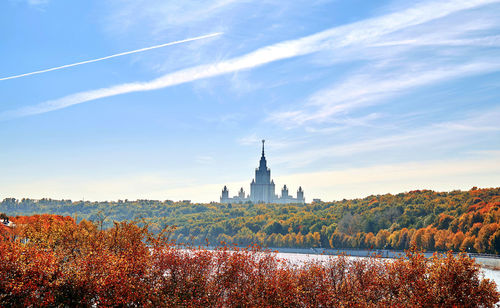 View of buildings against cloudy sky