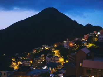 View of illuminated town at night