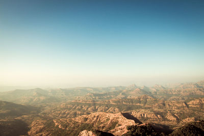 Scenic view of mountains against clear sky