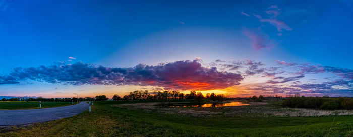 Scenic view of landscape against sky during sunset