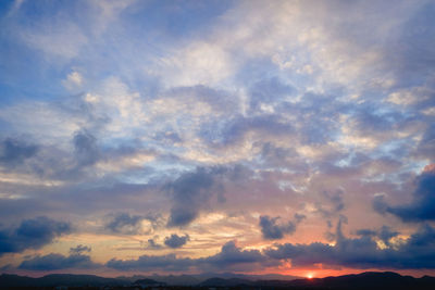 Low angle view of dramatic sky during sunset