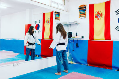 Woman standing in corridor