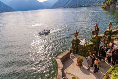 High angle view of people on boats in sea