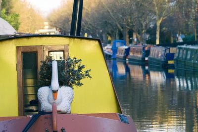 Close-up of swan boat moored in lake