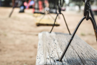 Close-up of swing at park