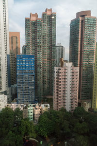 Skyscrapers in city against sky