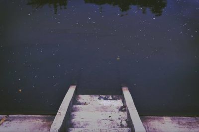 Staircase leading into stillwater