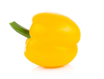 Close-up of yellow pepper against white background