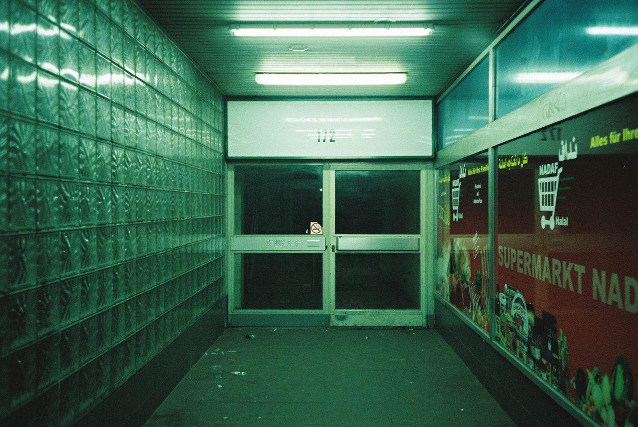 illuminated, indoors, lighting equipment, empty, tunnel, corridor, built structure, architecture, no people, day