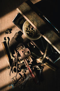 High angle view of old machinery on table