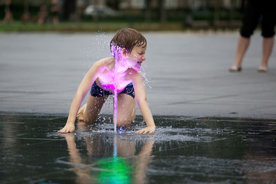 Girl playing in water