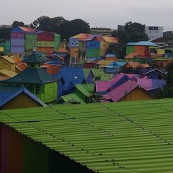 Houses against sky in city