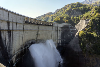 View of dam against mountain