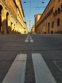 Surface level of road against buildings in city