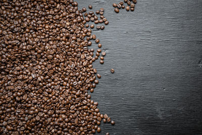 High angle view of roasted coffee beans on table