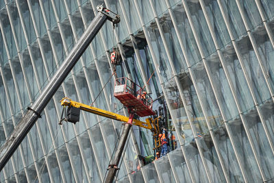 High angle view of people working on staircase