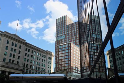 Low angle view of modern buildings against sky