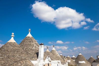 Low angle view of temple against blue sky