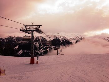 Scenic view of snow covered mountain against sky