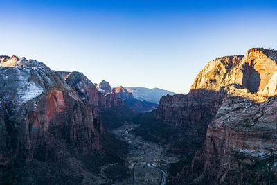 Scenic view of rocky mountains against clear sky