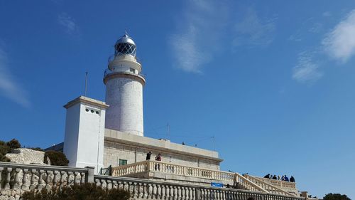 Low angle view of tower against cloudy sky