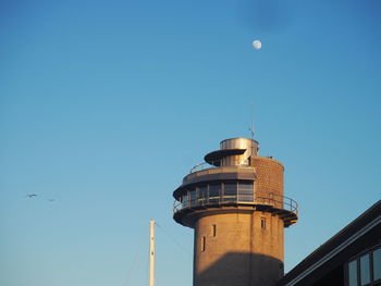 Low angle view of lighthouse against clear sky