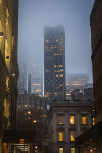 Illuminated buildings in city