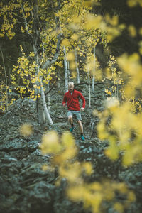 Man jogging in forest