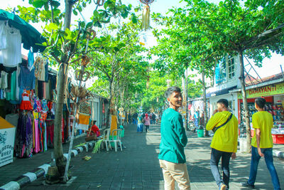 People walking on street in city