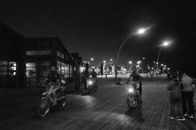 Illuminated street lights at night