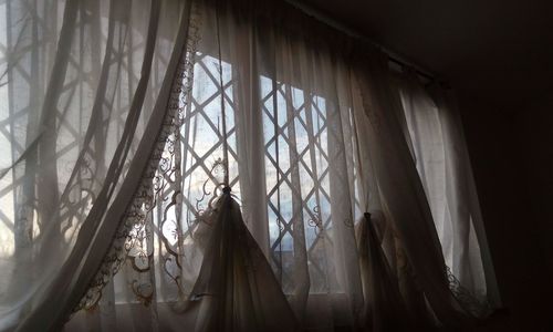 Panoramic view of curtain hanging from window