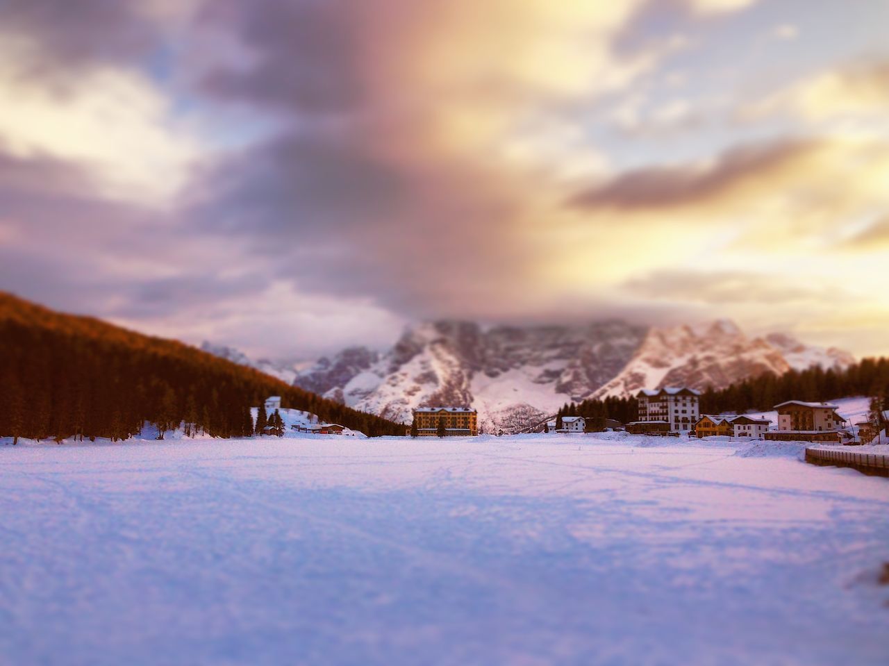 SNOW COVERED LANDSCAPE AGAINST SKY