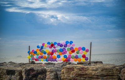 Scenic view of sea against cloudy sky