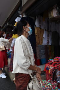 People at market stall