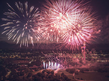 Firework display at night