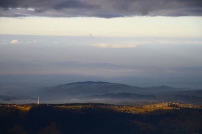 Scenic view of landscape against sky during sunset