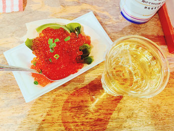 High angle view of strawberries in glass on table