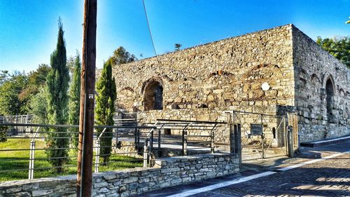 Facade of house against clear blue sky