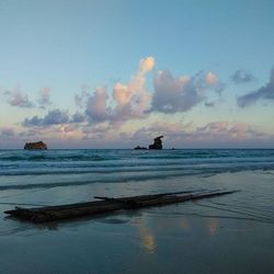 Scenic view of sea at sunset