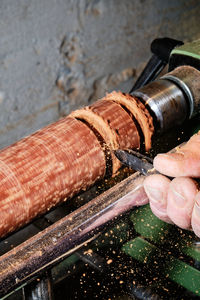 Cropped hand carving wood