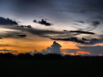 Scenic view of dramatic sky during sunset