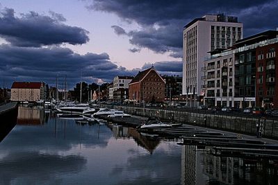 View of buildings against cloudy sky