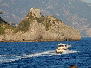 Boat sailing in sea