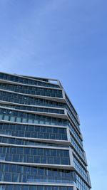 Low angle view of modern building against sky