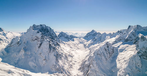 Amazing view of the high mountains covered with snow